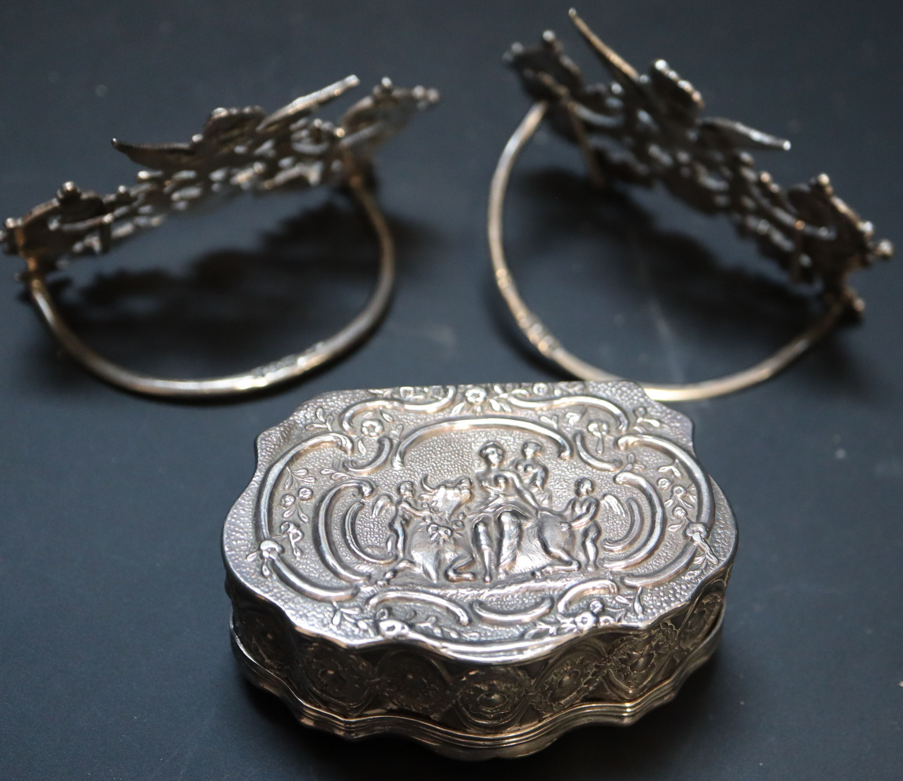 A pair of late Victorian pierced scroll silver menu holders,
